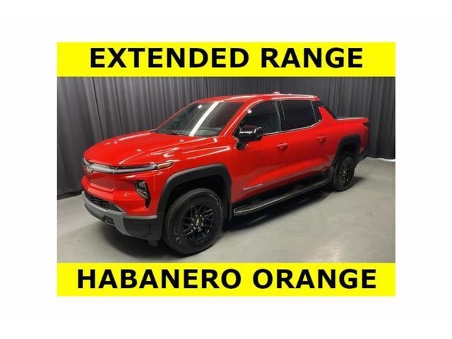 2025 Chevrolet Silverado EV LT - Extended Range in Habanero Orange — front three-quarter view
