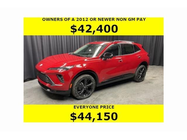 2026 Buick Envision Sport Touring in Brilliant Red — front three-quarter view