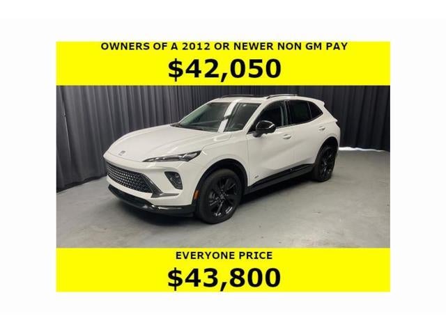 2026 Buick Envision Sport Touring in Summit White — front three-quarter view